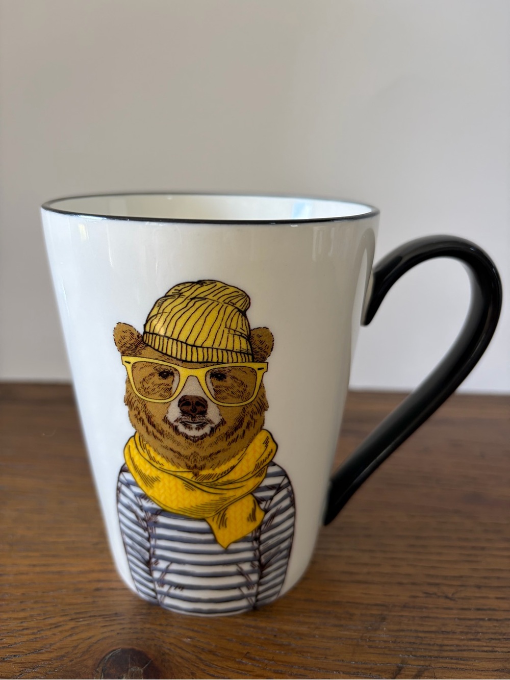 Signature Housewares Ceramic Bear Graphic Mug with Yellow Accents.